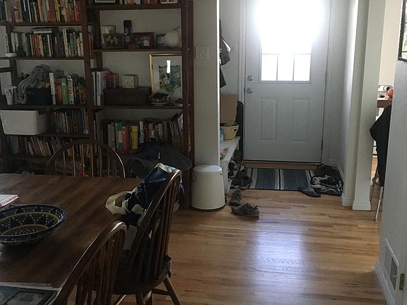 view of entrance from living room. Living room area is really large so we used to use half of it as the dining area. actual dining room is the room to the left