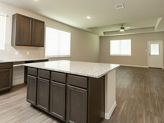 Kitchen to Dining Area and Family Room