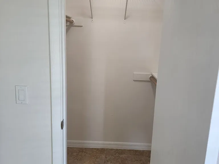 Mini walk in closet.