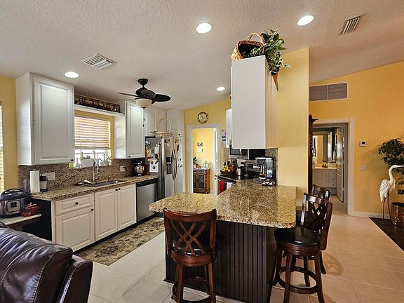 5th image of 7664 Pine Island Way