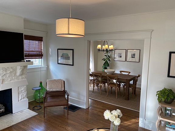 Front Livingroom Furnished looking into Dining Room.