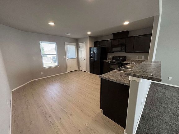 5th image of 6618 N 128th East Ct