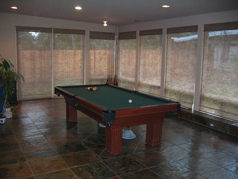 Old pic showing a 9' pool table for space (huge room)