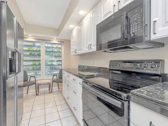 4th image of 7871 SAILBOAT KEY BOULEVARD S #108