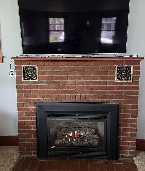 gas fireplace in living room, television included