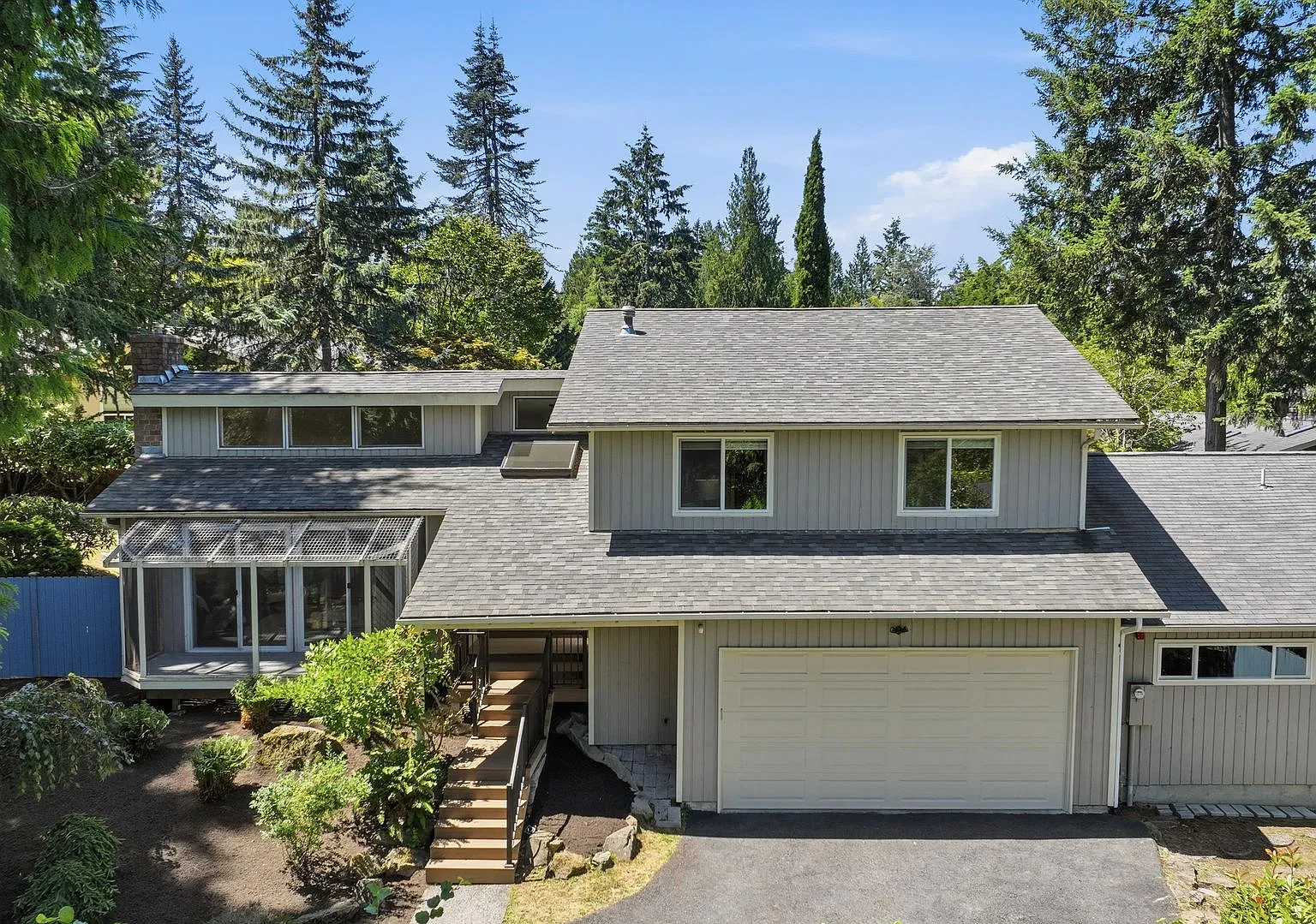 Spacious Tri-Level Home in West Lake Sammamish with Luxurious Features and Prime Location — Photo 1