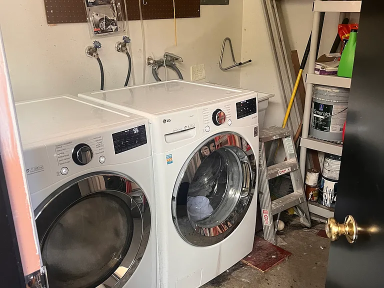 Extra (shared) laundry room in basement. No fee to use.