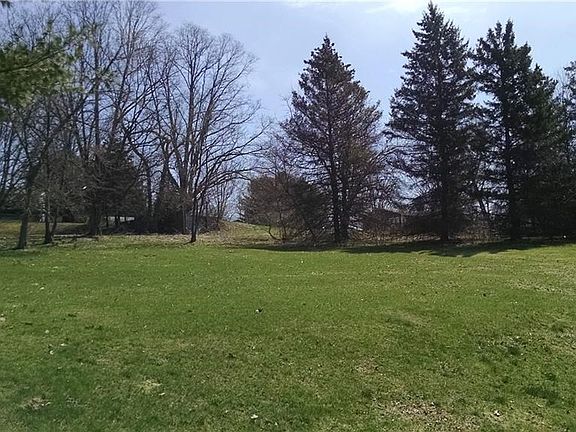 Another view of the serene backyard setting.