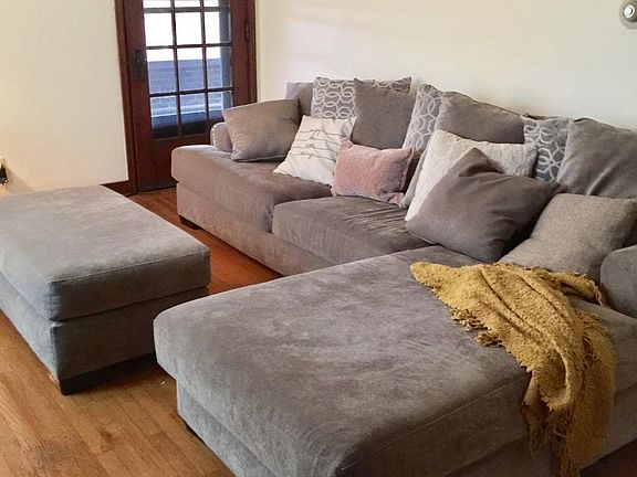Living room with access to the large, private porch