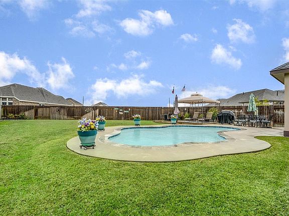 Sparkling pool with Extended patio and decking with gazebo stays!