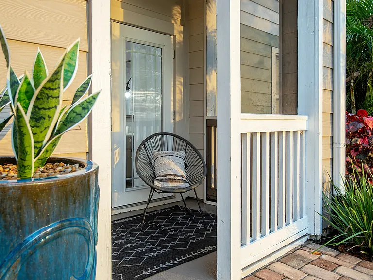 Your personal outdoor retreatthis private patio blends comfort and nature, offering the ideal spot for morning coffee or evening relaxation.