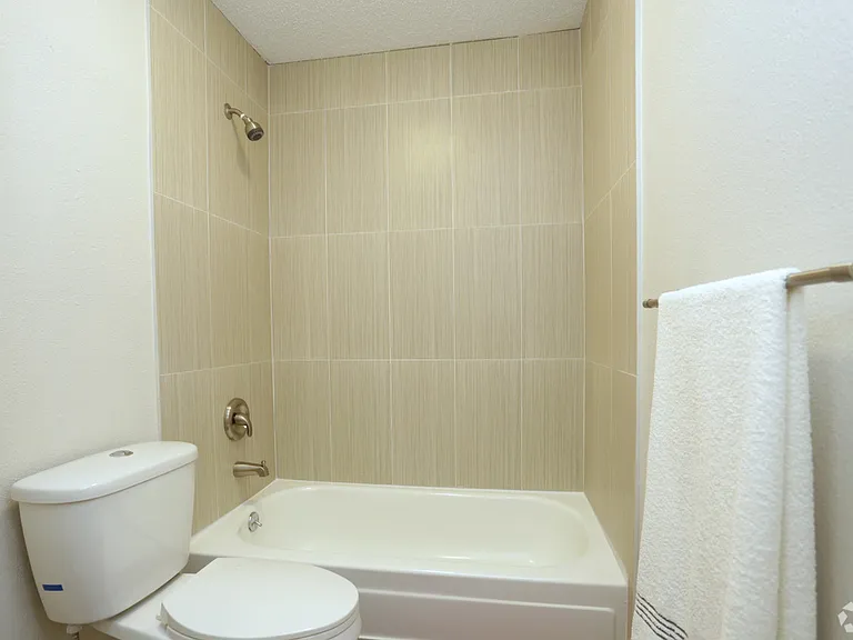 Soco at Alpine Bathroom Toilet and tub shower