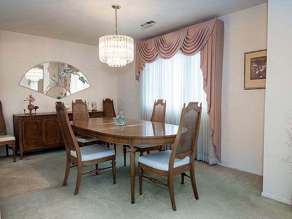 Open to the living room is the 12x10 dining room that allows you to expand your table into to host l