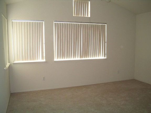 Master bedroom w/ lots of windows, Walk-In closet 2nd closet w/ organizers.