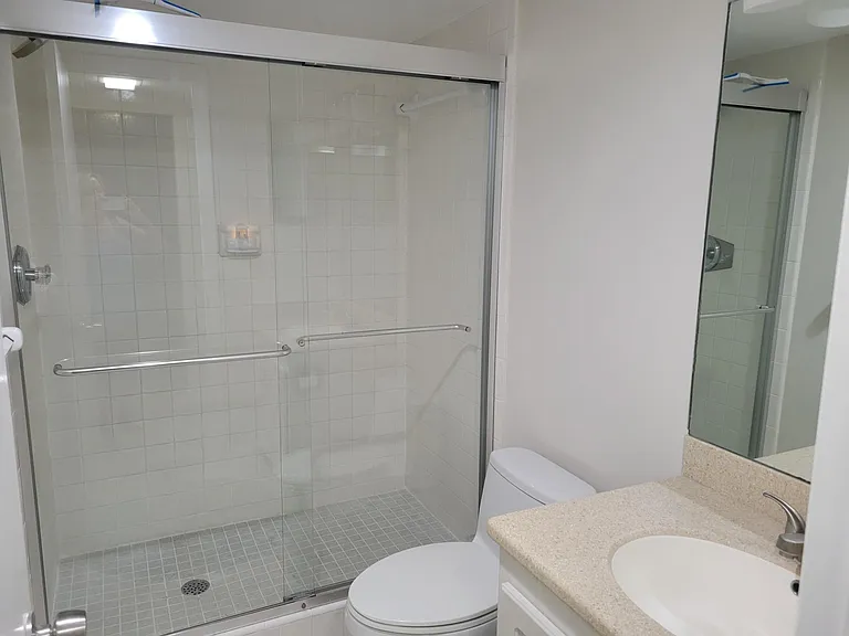 Master Bath with walk in shower & taller toilet.