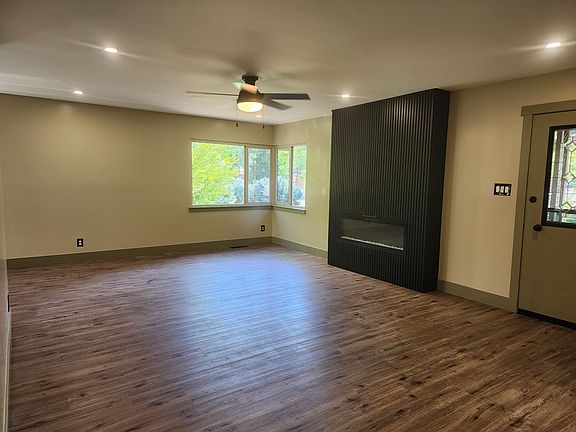 Entrance, living room with fireplace