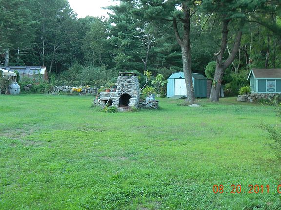 Outdoor fireplace and utility sheds