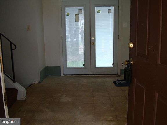 Foyer w/ French Doors Leading Out Back
