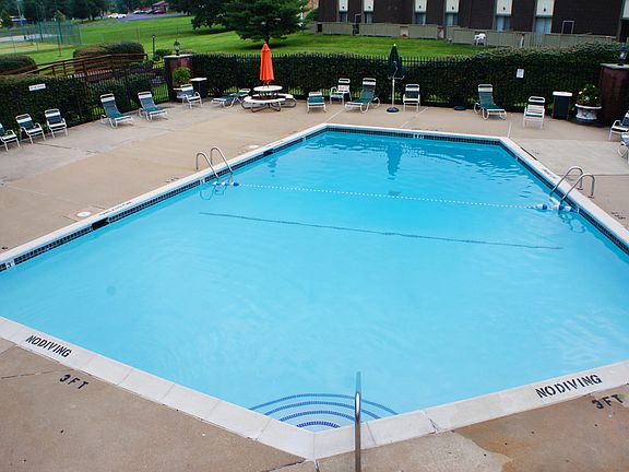 sparkling swimming pool River Chase Apartments in Florissant