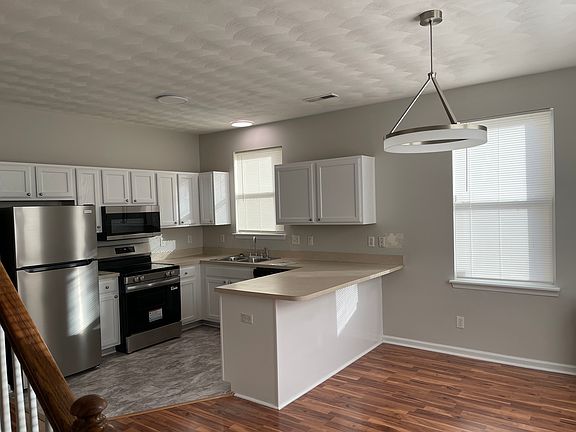 Kitchen with a small eating area or add bar stools to eat at the counter.