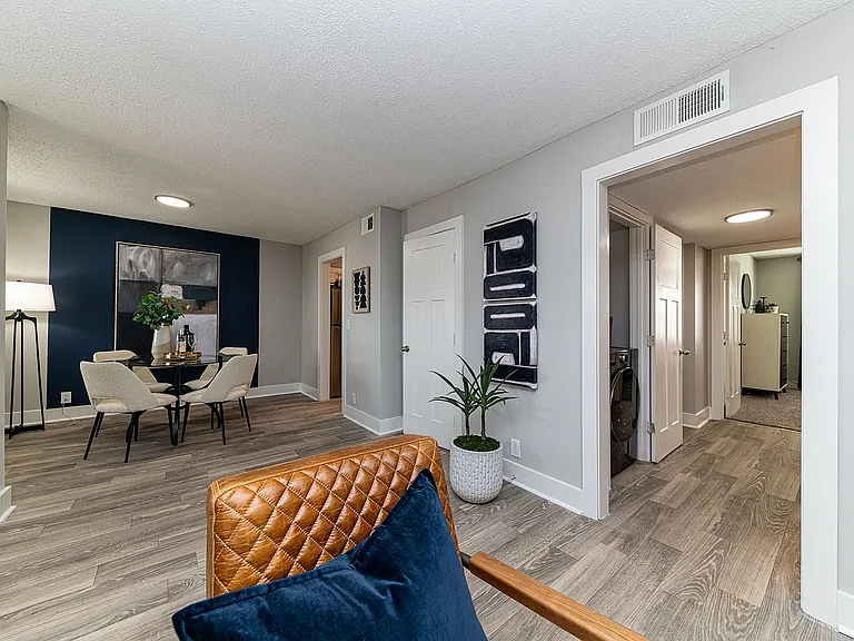 Dining room & living room with hardwood-style flooring