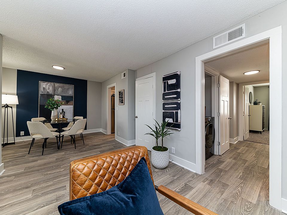 Dining room & living room with hardwood-style flooring