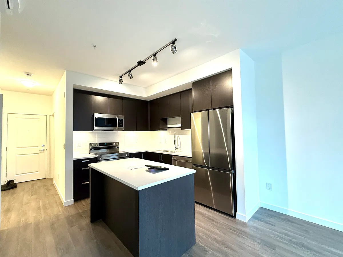 Photo 2 of 17 - 15733 85th Ave #215 - Surrey, BC Building Photo - 15733 85th Ave #215