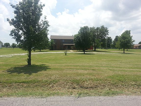 Long distance view of house.