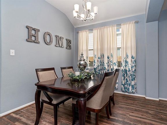 The formal dining space has versatility and could be used as a playroom, sitting area or office.