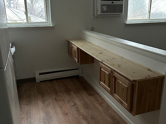Extra counterspace & storage cabinets. Photo of actual unit.