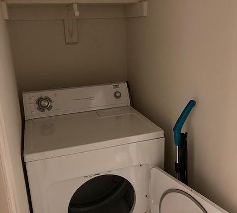 In unit washer and dryer with shelves