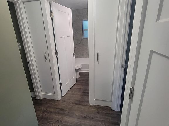 Hallway with clean built ins