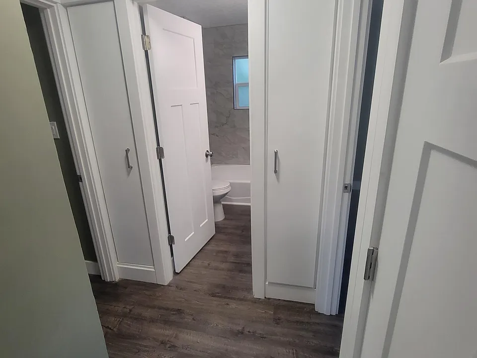 Hallway with clean built ins