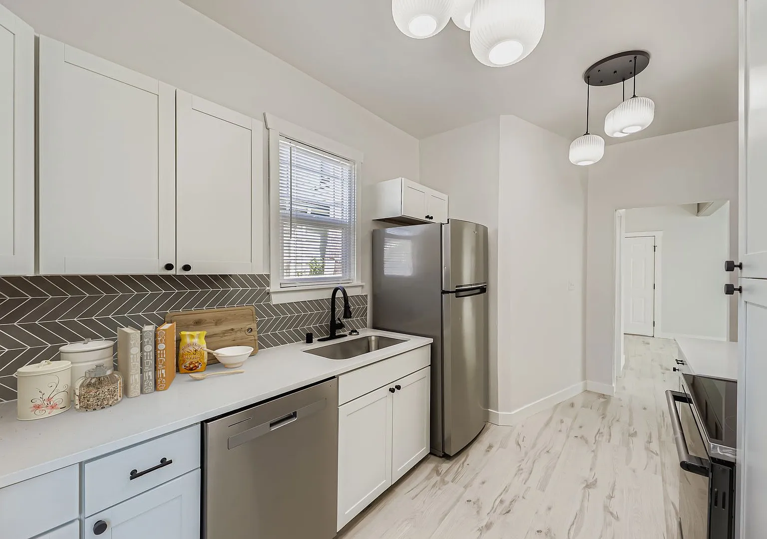 Breathtaking Renovation! Oversized 2 Bed 1 Bath Duplex Pre-lease it Now! — Photo 1