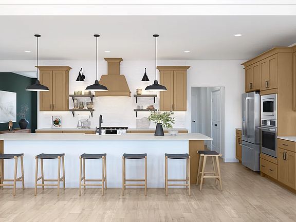 Kitchen with pendant lighting and floating shelves