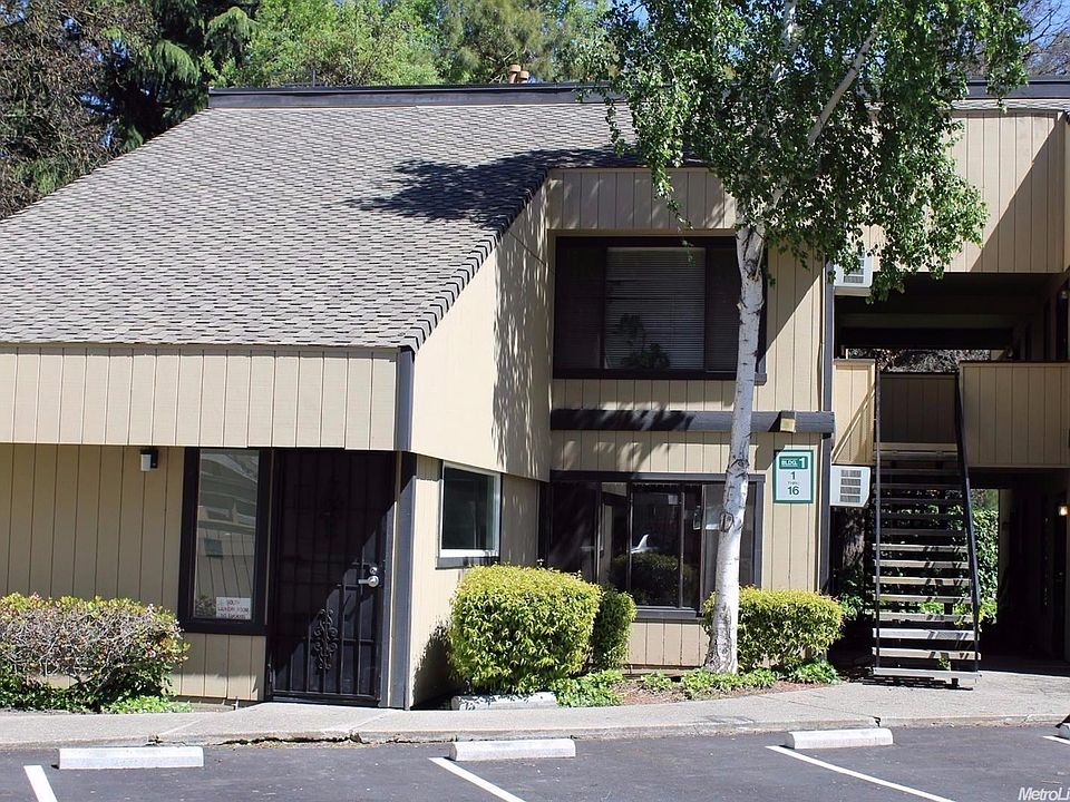 This lower level condo is just to the left of the stairway.  The Laundry Room Facility is to the left of the photo.