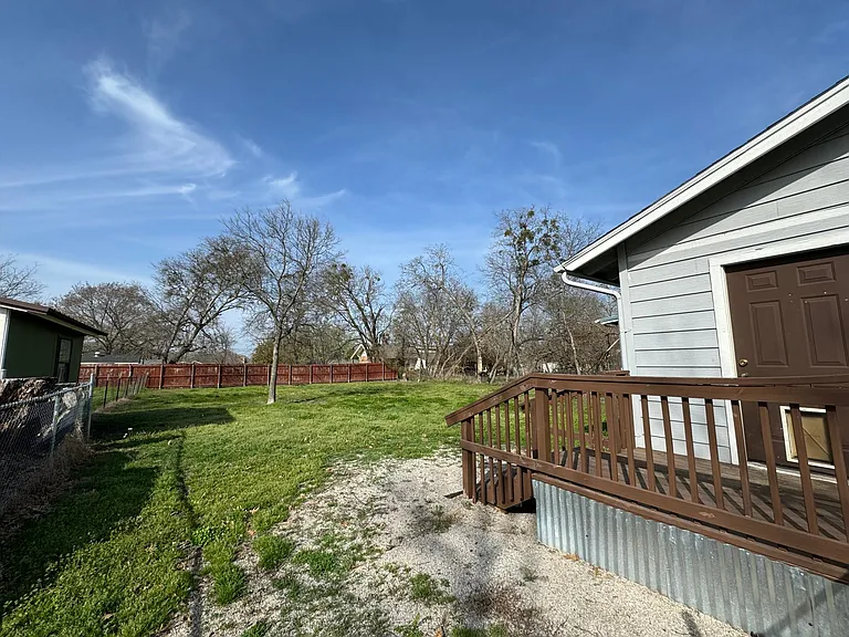 Large fenced in backyard