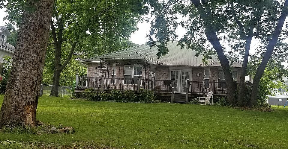 Rear view of house with deck