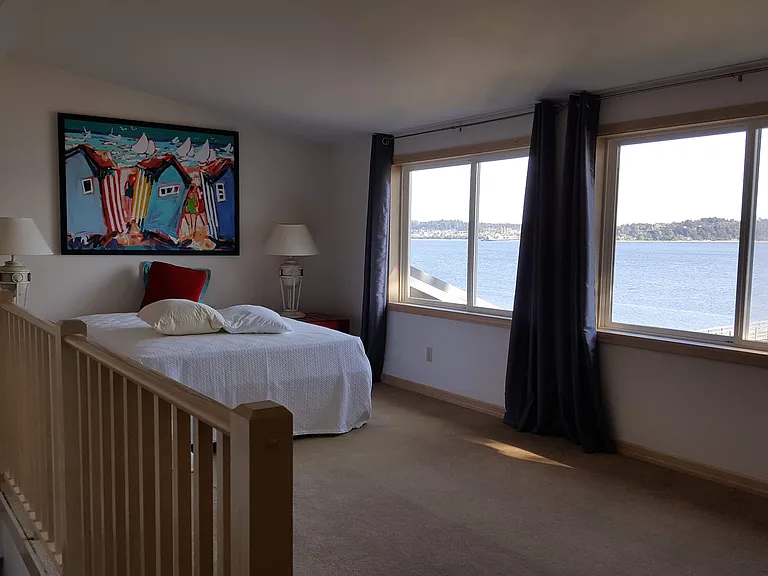 Upstairs bedroom with full bathroom