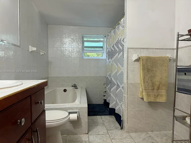 225 NE 175th Ter #A — Photo 18