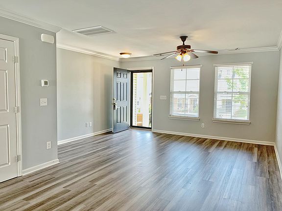 New floors, new paint, beautiful crown moulding!