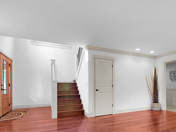 Step inside to a grand foyer and formal living room.