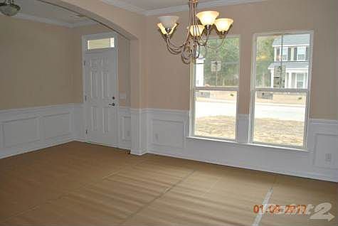 Formal dining room with laminate floors