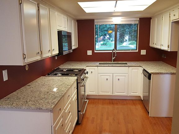 Kitchen with new cabinets and granite countertops (2017 remo
