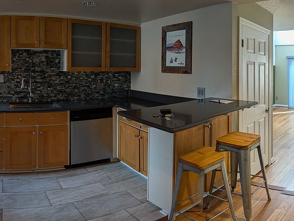 Updated Kitchen with Quartz tops and stainless steel appliances