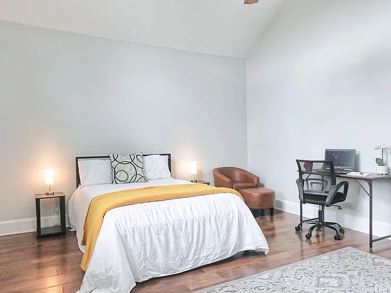 Large Bedroom with a double bed