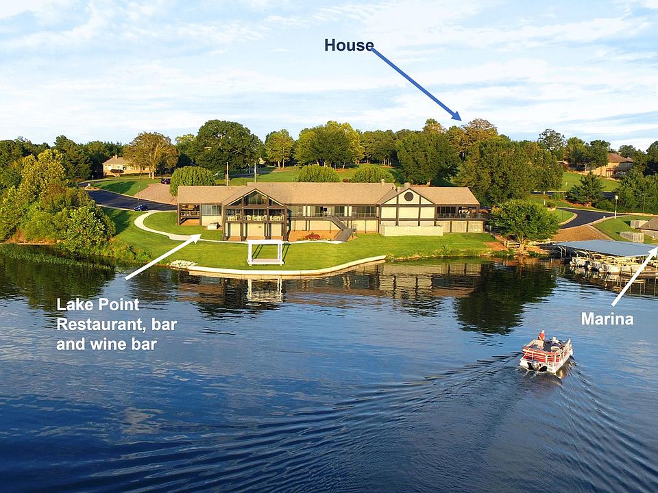 Nestled in a peaceful neighborhood, this home is just a few blocks from Lakepoint Restaurant, featuring a wine room and bar. Next door, the Marina offers full-service gas, boat rentals, and limited boat parking (contact POA for access).