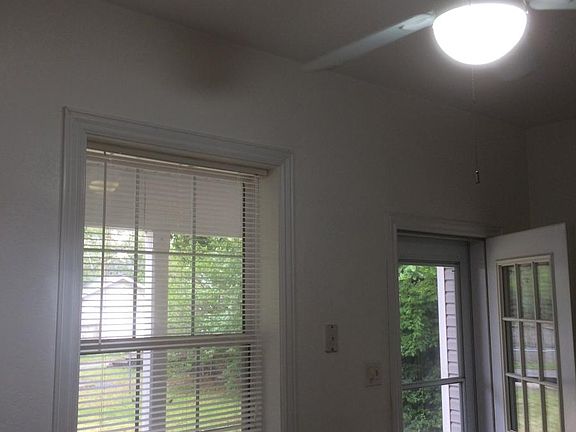 Eat in kitchen with skylight for nice light, back window as