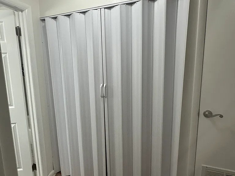 Laundry closet closed.