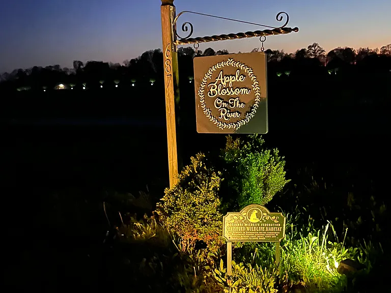 The entrance is marked with "Apple Blossom on the River". The property has been designated by the National Wildlife Association.